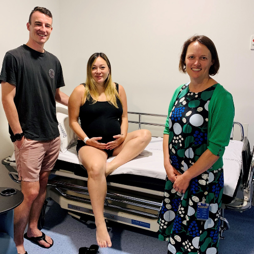 Dietitian with pregnant woman and husband Dietitian with pregnant woman and husband